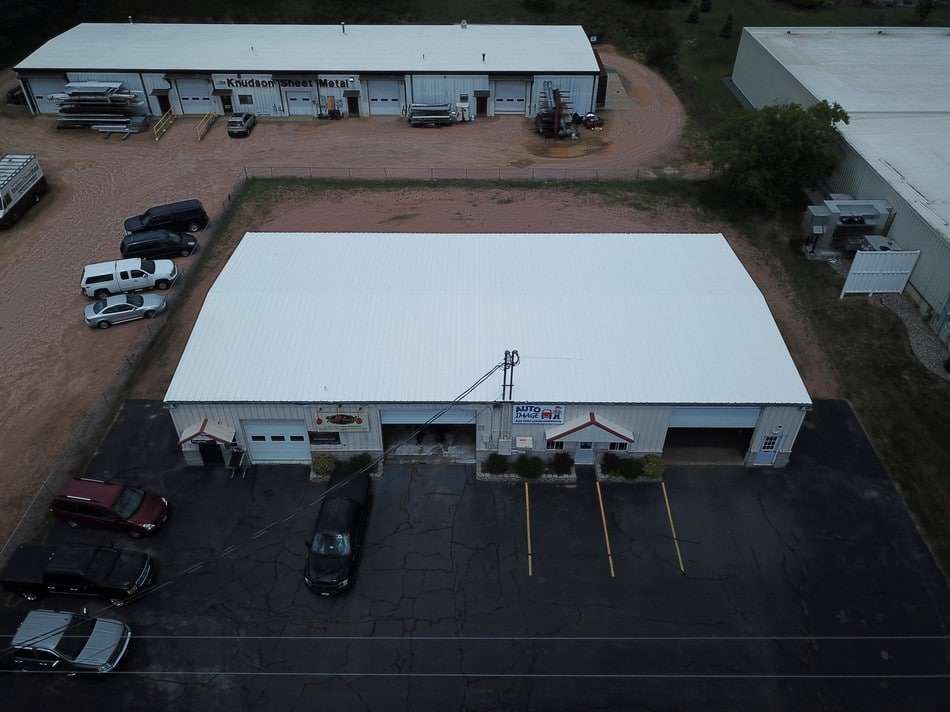 Completed metal roof restoration showing final results with superior weather resistance and coating